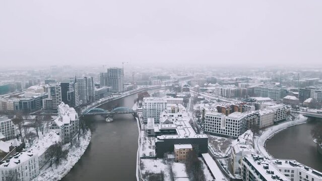 Winter aerial view with snowfall on Wroclaw with briges view 4k