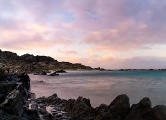 Papier Peint photo Plage de La Pelosa, Sardaigne, Italie sunset seascape with rocks and reef at Capo Falcone in Sardinia