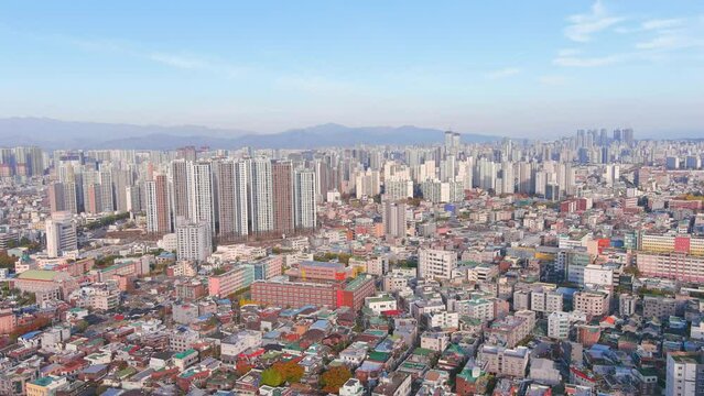 Daegu: Aerial view of Metropolitan City in South Korea in autumn colors, sunny day - landscape panorama of Eastern Asia from above