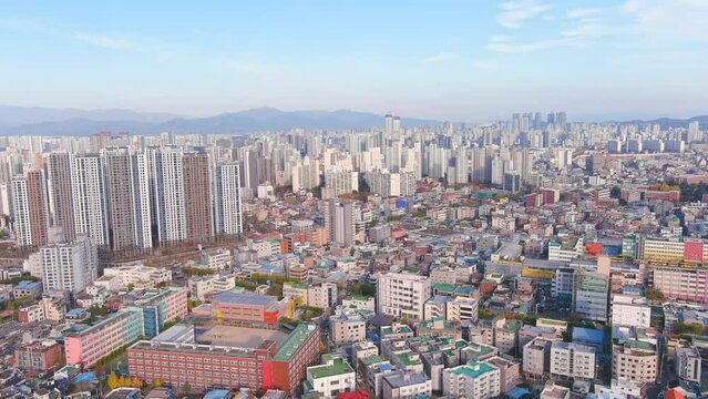 Daegu: Aerial view of Metropolitan City in South Korea in autumn colors, sunny day - landscape panorama of Eastern Asia from above