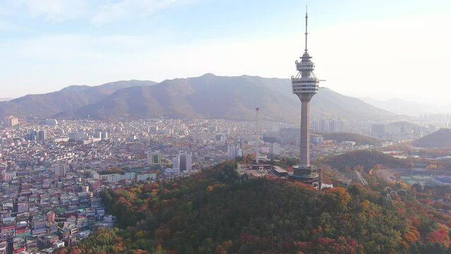 Daegu: Aerial view of Metropolitan City in South Korea, Duryu Park in autumn colors, sunny day - landscape panorama of Eastern Asia from above