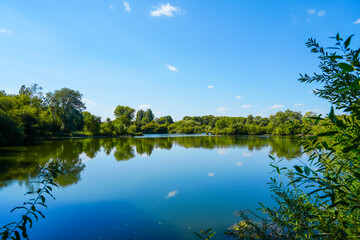 Landscape at the Koldinger Seen in the southern Leineaue. Nature reserve near Laatzen. Nature with lakes and green vegetation.
