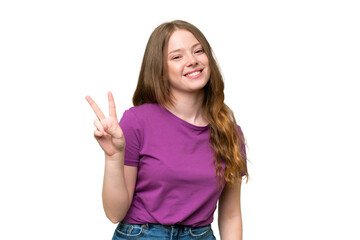 Young pretty woman over isolated background smiling and showing victory sign