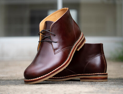Men fashion brown boots leather on the floor.