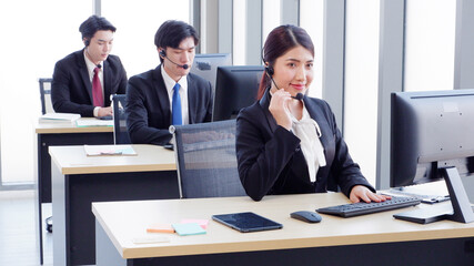 Call center staff serving customers.