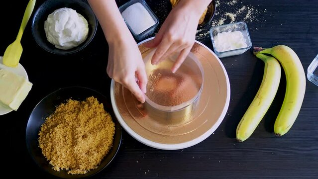 Cooking Banoffi cake at home in the kitchen, pastry recipe.
