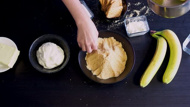 Cooking Banoffi cake at home in the kitchen, pastry recipe.