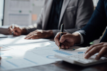 Accounting fund managers meeting to planning to improve quality next year team consultation investment stock market analysis and checking document, investigation of corruption account. anti bribery