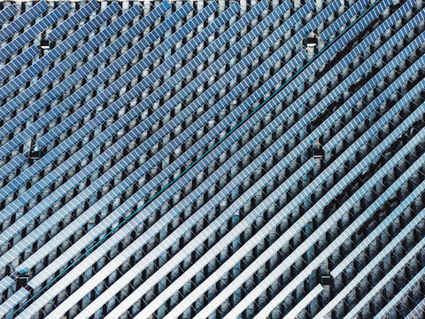 Never Ending View Of Solar Panels Stacked In Lines On The Rooftop 