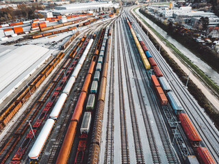 Aerial view of railway lines with cargo trains parked on the lines