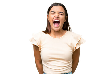 Young caucasian woman isolated on green chroma background shouting to the front with mouth wide open