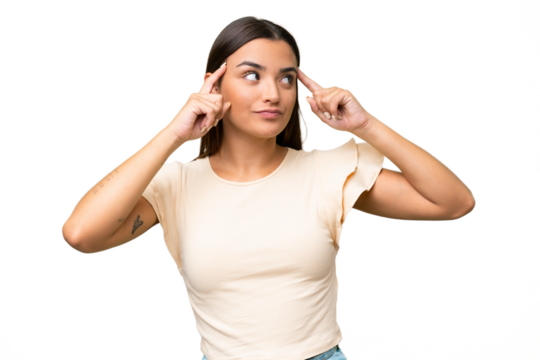 Young caucasian woman isolated on green chroma background having doubts and thinking