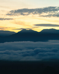 Sea clouds during golden sunrise above Titiwangsa mountains in Lenggong, Perak.