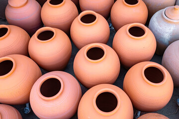 Omani Souvenirs. Hand Made Pottery in Nizwa Market. Clay Jars at the Rural Traditional Arabic Bazaar, Oman. Arabian Peninsula. 