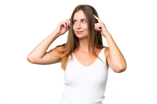 Young pretty woman over isolated background having doubts and thinking