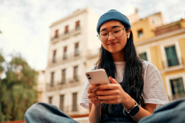 Asian female tourist student on city streets