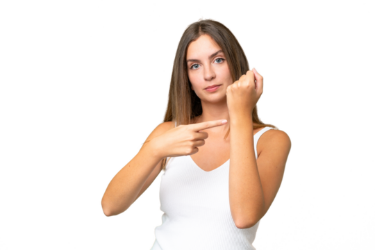 Young pretty woman over isolated background making the gesture of being late