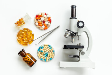 Medical drags quality research with microscope in microbialogical labaratory