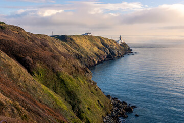 Hiking trail on Howth Island, Dublin, Ireland and Baily Lighthouse