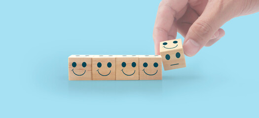 Wooden cubes in hand with copy space for input wording