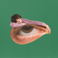 Contemporary art collage. Conceptual image. Sad, depressed young boy lying on human eye. Feeling tired. Breakdown