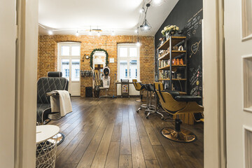 Premium co-working space for hair masters. Modern workplace of hairdressers. Camera entering a room. High quality photo