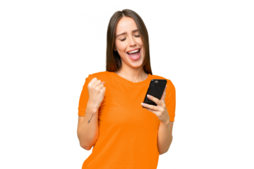 Young pretty caucasian woman over isolated background with phone in victory position