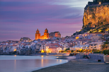 Obraz na płótnie Canvas Cefalu, Sicily, Italy. Cityscape image if coastal town Cefalu in Sicily at dramatic sunrise.