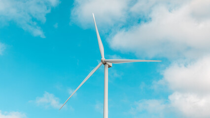 Aerial view of powerful Wind turbine farm for energy production on beautiful cloudy sky at...