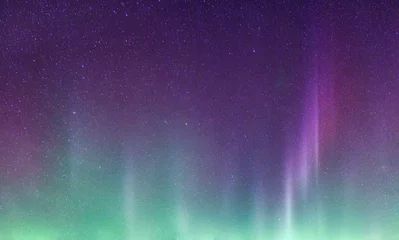 Keuken foto achterwand Noorderlicht Beautiful purple and green aurora borealis and starry glowing in the night sky on arctic circle