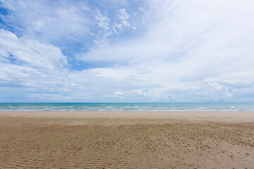 Natural scenery of a beautiful tropical beach. The sky is clear with little sunlight.