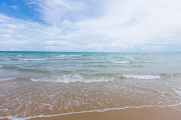 Natural scenery of a beautiful tropical beach. The sky is clear with little sunlight.