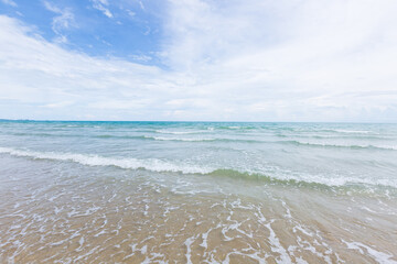 Natural scenery of a beautiful tropical beach. The sky is clear with little sunlight.