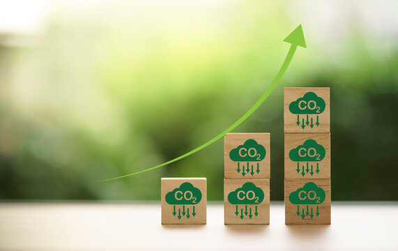 Stacking CO2 reducing icon with up arrow for decrease CO2 , carbon footprint and carbon credit to limit global warming from climate change, Bio Circular Green Economy concept.