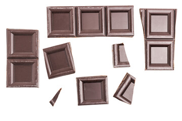 Dark chocolate pieces, cubes, broken chocolate isolated on white background, top view