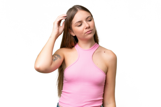 Young beautiful blonde woman over isolated background having doubts while scratching head