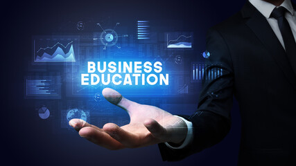 Hand of Businessman holding motivational message