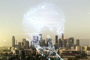 Abstract creative world map interface on Los Angeles skyline background, international trading...