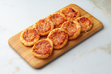 Banquet table with variety of stuffed pies pastry