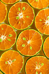 Macro orange,Heap of fresh orange slices background. Healthy nutrition with vitamin c. Close up view.