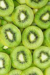 Macro kiwi,Top view of sliced kiwi with water splashes. Fresh juicy food and drink background. 