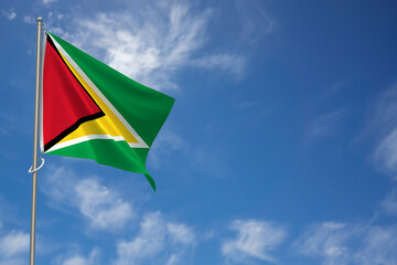 Co-operative Republic of Guyana Flag over Blue Sky Background. 3D Illustration
