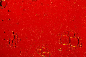 Macro red bubbles,abstract red wine bubbles, close-up shot,Oil and water drops background
