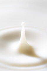 Macro milk drop texture,milk or white liquid splash with circle ripple