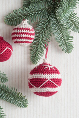 Beautiful cute crocheted christmas balls for decoration with copyspace