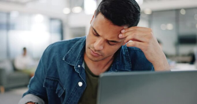 Thinking, confused and man at laptop writing notes for project planning at web design company. Professional ux employee at office working, thoughtful and focused on email idea for client.