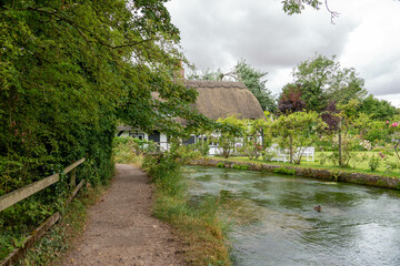The Fulling Mill across the River Alre in Alresford Hampshire England