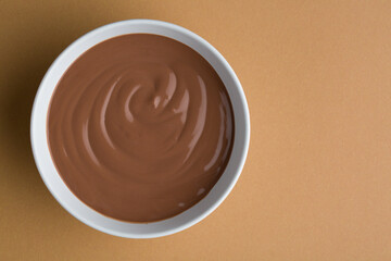 Swirl in a cup of hot chocolate top view