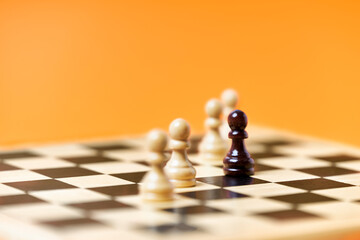 Chess row of white pawns with black pawn challenge center