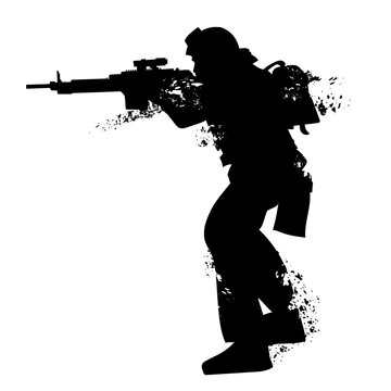 vector silhouette of a soldier in armor with a machine gun